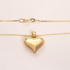 Our High Quality Real Gold Heart Necklace Is A Timeless Classic For The One You Love. This Elegant Puffy Heart Pendant Is Finished With A Fine Solid Gold Italian Box Chain. Real Yellow Gold - Not Plated Gold! Stamped 10k 10k Real Gold Heart (Puffed- Hollow) Size (Including Bail): 19.5 Mm X 16 Mm X 6 Mm Thickness 10k Real Gold Fine Italian Box Chain Finished With A Spring Clasp. Chain Lengt Elegant Heart Pendant With Box Chain, Elegant Heart Pendant Jewelry With Box Chain, Formal 14k Gold Heart Necklace, Gold Heart Pendant With Box Chain, Gold Heart Pendant Jewelry With Box Chain, 14k Gold Heart Necklace Fine Jewelry Tarnish Resistant, 14k Gold Tarnish Resistant Fine Heart Necklace, 14k Gold Tarnish Resistant Heart Necklace, 14k Yellow Gold Heart Necklace Fine Jewelry