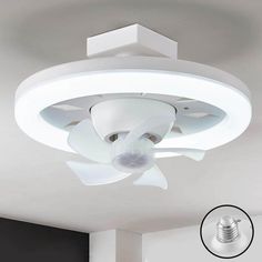 a white ceiling fan mounted to the ceiling