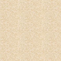 a beige and white wallpaper with leaves on it