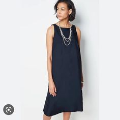 Sleeveless Navy Blue Dress Pleated Back Buttons At Back Of Neck Effortlessly Chic Style Approx 42” Length Sleeveless Shift Midi Dress For Daywear, Sleeveless Shift Midi Dress For Work, Elegant Sleeveless Shift Midi Dress, Elegant Blue Sleeveless Dress For Daywear, Ponte Knit Dress, Red Sheath Dress, Knit Shirt Dress, Linen Shift Dress, Spring Maxi Dress