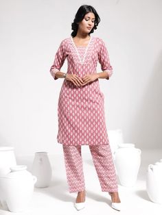 VASTRAMAY Women's Pink Printed Cotton Kantha Kurta Pant Set Look stylish and comfortable in this pink printed cotton kurta pant set by Vastramay. Features intricate kantha stitch and a relaxed fit. Key Features Pink printed cotton fabric Kantha stitch detailing Relaxed fit kurta and pants Specifications Please refer to the Vastramay website or product label for detailed specifications. Material & Care Material: Cotton Care: Hand-wash recommended Legal Disclaimer: The product is guaranteed to be Festive Pink Block Print Palazzo Set, Casual Pink Cotton Pant Set, Unstitched Pink Pant Set With Chikankari Embroidery, Festive Cotton Kurta With Straight Pants, Pink Block Print Palazzo Set For Navratri, Pink Block Print Palazzo Set For Diwali, Pink Bollywood Pant Set With Chikankari Embroidery, Pink Block Print Sets With Long Sleeves, Bollywood Style Pink Block Print Sets