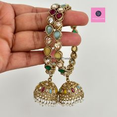 Restocked Bollywood Style Polki Kundan antique finish Jhumka Bangles Set Punjabi Pearl bangles Set/Bridal bangles/ wedding jewelry/pakistani This is 100% Handmade jewelry. So Color, shades, texture displayed may slightly vary from the actual product due to digital image limitations. We request you to consider these minor variations. Please expect the possibility of some slight imperfections when buying handmade jewelry. If you have any questions, please message or email us. Arrives in a gift box. Please let me know if you have any questions. Thank you so much for visiting my shop. Bollywood Bangle With Latkans For Festive Occasions, Bollywood Style Bangle With Latkans For Festive Occasions, Festive Bollywood Bangle With Latkans, Traditional Multicolor Metal Bangle, Festive Kundan Bangle With Latkans, Bollywood Style Kundan Bangle With Latkans, Festive Chandbali Bangle With Latkans, Heavy Chandbali Bangle For Celebration, Polki Earrings