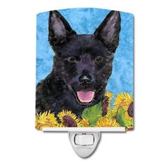 a black german shepherd dog with sunflowers night light