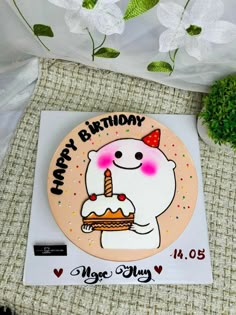 a happy birthday plate with a cartoon bear holding a piece of cake on top of it