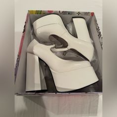 Never Worn Shoes In Original Box. White Chunky Platform Heels With Round Toe, White Heels With Chunky Platform And Round Toe, White Chunky Platform Heels Medium Width, White Square Toe Heels With 4-inch Heel, Cream Patent Leather Platform Heels, White Patent Leather Closed Toe Heels, White Closed Toe Patent Leather Heels, White Patent Leather High Heels, White Platform Heels With Square Toe