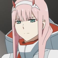 an anime character with long pink hair and horns on her head looking at the camera