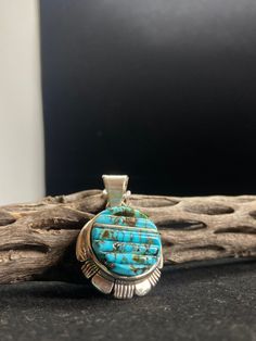 Southwestern Engraved Turquoise Necklace In Sterling Silver, Untreated Sterling Silver Round Pendant, Engraved Turquoise Necklace With Round Pendant, Turquoise Engraved Round Pendant Necklace, Southwestern Oval Jewelry With Polished Finish, Southwestern Style Oval Jewelry With Polished Finish, Traditional Turquoise Sterling Silver Necklace, Collectible Turquoise Necklace With Round Pendant, Collectible Turquoise Round Pendant Necklace