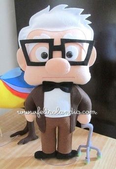 an old man with glasses and a cane is standing on a table next to a balloon