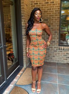 Make a statement in our Amelia Stretchy African Print Tube Dress this summer. This dress is perfect for any occasion and is sure to turn heads. The dress is made with a very stretchy African Ankara Dashiki Kente pattern fabric, with a bodycon fit that accentuates your figure. The sleeveless design and detachable straps make it perfect for any event. * Bold and Classy Design * Matching Headwrap and Mask also available * Bodycon fit * Sleeveless Design * Detachable Straps * Perfect for cocktail, b African Print Dresses Designs Classy, Engagement Party Dinner, Plus Size Belt, Short Ankara Dresses, Kente Pattern, African Dress Styles, Ankara Dress Styles, Printed Short Dresses, African Print Dress Designs