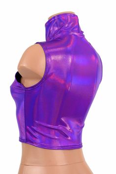 "This item is made to order, please read all the way through the listing before purchasing! This sizzling hot purple holographic top has an amazing fuchsia holographic shine! It features an adorable turtle neck neckline in front with a sleeveless design. It is made of four way stretch lycra spandex, and it fits like a glove! Super figure flaunting and fun! LENGTH: 8\" (from the underarm to the hemline) Womens Sizing (See below for instructions on where measurements should be taken) XXS: Bust 29\ Stretch Sleeveless Rave Tops, Sleeveless Stretch Rave Tops, Purple Club Tops For Summer, Purple Sleeveless Club Top, Purple Summer Club Tops, Purple Summer Tops For Club, Fitted Rave Top For Club, Purple Fitted Sleeveless Top, Fitted Sleeveless Disco Top