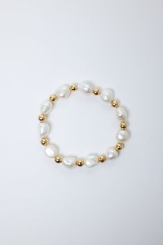 PG Designs Grace Bracelet Pearl like with Gold Beads Stretch Bracelet Can get wet Avoid chlorine and perfumes PG Designs Gold Stretch Bracelet, Gold Bead Bracelets, Pearl Design, Beaded Stretch Bracelet, Gold Beads, Pearl Bracelet, Stretch Bracelets, Cute Jewelry, Summer Nails