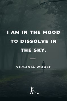 a person walking down a path in the woods with a quote from virginia wolf on it