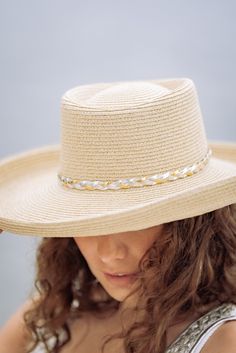 You'll have the perfect accessory for sunny days with the Sailor - Turned Brim Gambler. This lightweight hat is made of 80% paper and 20% polyester for a comfortable fit, with an adjustable band so you can find your perfect size. Plus, the brim size of 4" and UPF 50+ sun protection offers superior protection from the sun. Make a statement with the Silver tone and ultra braid turned brim gambler with mixed metallic braided PU band. Sun Hats With Upf 50+ For Poolside, Lightweight Straw Hat For Poolside, Adjustable Sun Hat For Vacation, Adjustable Wide Brim Sun Hat For Poolside, Lightweight Adjustable Sun Hat For Poolside, Adjustable Sun Hat For Poolside, Adjustable Lightweight Sun Hat For Poolside, Adjustable Beige Straw Hat For Poolside, Beige Brimmed Sun Hat For Poolside