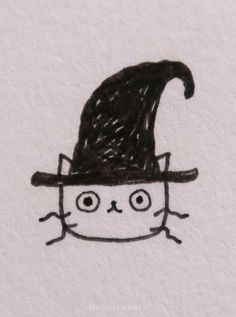 a black and white drawing of a cat wearing a witches hat