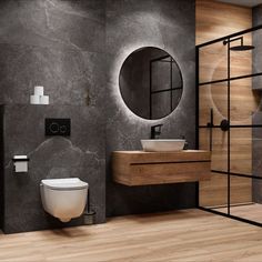 a bathroom with a toilet, sink and mirror in it's center wall area