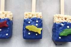 three marshmallow pops decorated with sea creatures