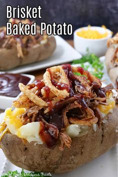 the baked potato is loaded with barbecued potatoes and toppings, along with other side dishes