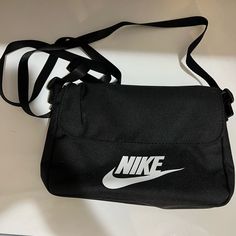 All Orders Ship 1-2 Business Days! Nike Cross Body Bag. Black With White “Nike” And Swoosh. Conditions: Like New/Clean/Good Condition/No Holes/No Stains/No Pilling/No Fade Never Worn Size: Os Nike Cross Body Bag, Nike Cross, Cross Body Bag Black, Nike Bags, White Nike, Cross Body Bag, White Nikes, Body Bag, Black Nikes