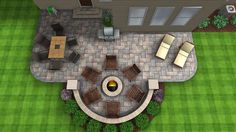 an aerial view of a patio and fire pit