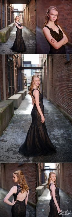 a woman in a black dress posing for the camera with her hands on her hips