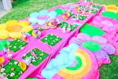 the table is set up with colorful decorations