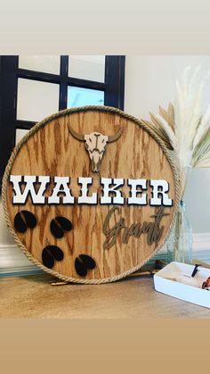 a wooden sign with the word walker built into it