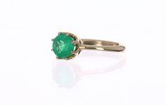 Setting Style: Solitaire Setting Material: 14K Gold Gold weight: 2.8 grams Main Stone: Emerald Shape: Round Approx Weight: 1.0-carat Measurement: 6.5 mm x 6.5 mm Clarity: Semi-transparent Color: Green Luster: Very Good Origin: Colombia If you have a special request for a custom created item please contact us at 1 800 840 6828. Complimentary shipping with the USA & Certification of Appraisal! Timeless Solitaire Emerald Ring With Round Cut, Formal Solitaire Emerald Ring, 14k Gold Emerald Solitaire Ring With Round Cut, 14k Gold Solitaire Emerald Ring With Round Cut, Classic Solitaire Round Cut Emerald Ring, Classic Solitaire Emerald Ring With Round Cut, Classic Round Emerald Ring, Classic Emerald Ring With Prong Setting, Classic Solitaire Emerald Ring