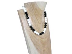 This simply designed necklace has been hand crafted using 8mm Black Onyx & 8mm Snow White Agate round beads to give that monochrome look.
This necklace is finished with a Sterling Silver bolt ring clasp fastener & fittings & is 18" - 18.5" in length, depending on the exact sizes of the beads.
This striking necklace is sure to get you noticed & can be worn at any time.

Materials
Natural Black Onyx Semi Precious Gemstones
Natural White Agate Semi Precious Gemstones
Genuine UK .925 Sterling Silver
Professional Quality Beadsmith Strong & Flexible 49 Strand Thread
Length - 18" - 18.5"
Width - 8mm
Chakra - Crown (Agate), Base (Onyx)
Zodiac Birthstone - Gemini, Virgo (Agate), Gemini, Leo (Onyx)
# uniquedesigns #handmadenecklace #everydayjewellery @htlmp  #shopsmall @craftersguild #handmadehour Gemini Leo, Bolt Ring, Gemini Virgo, Birmingham Uk, White Agate, Swarovski Pearls, Precious Gemstones, Sterling Silver Necklace, Minimalist Jewelry