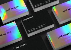 business cards with holographics and the words soul scopes on them, all in different colors