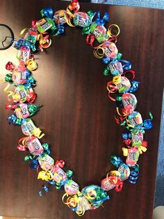 a bunch of candy on top of a wooden table