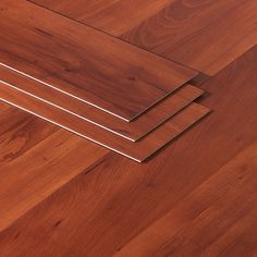 three different types of wood flooring laying on top of each other