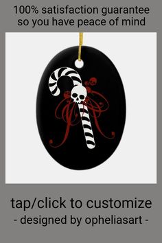 a christmas ornament with an image of a candy cane and skull on it