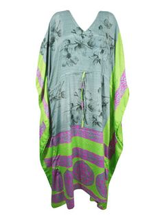 Boho Beach Kaftan, Gray, Green Floral, Silk Kaftan L-2X The Bohemian Summer Caftan, handmade from recycled silk saris is ideal for vacations or resort days. This relaxed kimono-style maxi dress is a combination of casual luxury and eco-conscious fashion. Featuring an adjustable drawstring waist and crafted from recycled materials, these boho dresses are great housedresses or versatile beach cover-ups. With the surge in popularity of boho weddings set against natural backdrops, the comfortable ka Luxury Green Beach Cover-up Dress, Luxury Green Silk Kaftan, Recycled Sari Silk Dress, Summer Caftan, Bohemian Chic Style, Kimono Kaftan, Beach Kaftan, Dress Kaftan, Bohemian Chic Fashion