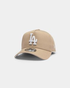 the new era los angeles dodgers baseball cap in khaki with white embroidery on the front