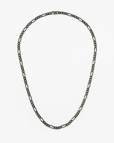 Mens Black Filia Chain Necklace | Sterling Silver Black Rhodium Plated. Handcrafted for Him. Our Classic Filia Chain is Upgraded with Larger Figaro Links and Our First-Ever Black Ruthenium Plating. The Necklace is Finished with a New Chunky Clasp – Designed to Match the Width of Our Statement Chains for a Seamless Finish. Metal: Black Rhodium Plated on Recycled Sterling Silver Chain Width 4. 6mm Total Length: 520mm Weight: 16. 4g Product Code: Mj-R-N22-Ns Black Chain Necklace, Earring Trends, Sterling Silver Mens, Black Chain, Black Rhodium, Pearl Gemstone, Product Introduction, Recycled Sterling Silver, Necklace Sizes