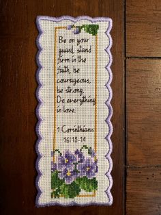 a cross stitch bookmark with the words, be an your guard stand firm in the faith