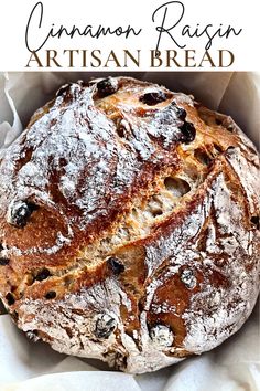 an artisan bread with blueberries on top and the title above it reads cinnamon raisin artisan bread