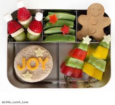 a metal tray filled with different types of food and snacks to eat for christmas or new year's eve