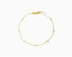 14K Yellow Gold Ball Station Bracelet. This elegant 14K yellow gold bracelet features bead stations on a 7 diamond cut cable chain bracelet with a 0.5 extender that closes with a lobster claw clasp. aka Precious Metal Yellow Gold Chain Bracelet With Extender, Adjustable Yellow Gold Bracelet With Satellite Chain, Modern Gold Bracelet With Satellite Chain, Adjustable Yellow Gold Cable Chain Bracelet, Classic Yellow Gold Bracelet With Satellite Chain, 14k Yellow Gold Bracelet With Satellite Chain, Elegant Yellow Gold Chain Bracelet With Extender, Gold Bracelets With Satellite Chain For Formal Occasions, Formal Gold Bracelets With Satellite Chain