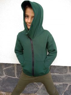 Extravagant Cotton Fleece Hoodie with Asymmetric Closure for Kids, KD806CF The Sweatshit features front zipper, front pockets,hood and attached hood. You can choose the color from the color palette and specify your preferences in the note to seller section during the transaction. Can be made according to the boys measurements and preferred length without additional fees. I DO NOT CHARGE extra money for custom orders.   The fabric is cotton fleece ( The outer side is knit.The inner side has a low pile that is smooth and soft ) Can be made in ALL SIZES. Enjoy this jacket and always be in a good mood! ALL GARMENTS IN THIS SHOP ARE MADE ACCORDING TO YOUR MEASUREMENTS.  PLEASE GIVE YOUR SIZE (MEASUREMENTS) IN THE ETSY NOTE TO THE SELLER SECTION DURING THE TRANSACTION. How to take measurements: Long Sleeve Fleece Hooded Jacket With Zipper, Fall Hoodie With Zipper For Outdoor, Fall Outdoor Hoodie With Zipper Closure, Fall Outdoor Hoodie With Zipper, Solid Hooded Sweatshirt With Zipper Closure, Solid Color Hooded Sweatshirt With Zipper, Fleece Hoodie With Side Pockets For Outdoor, Hooded Fleece Jacket With Zipper For Fall, Long Sleeve Sweatshirt With Zipper For Outdoor