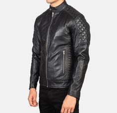 This quilted leather jacket has a unique style with a sleek fitted silhouette, blending classic, timeless fashion with a modern touch. Made of premium black leather, this jacket has an elegant, polished look and fulfills the perfect biker jacket requirement. It has a quilted viscose lining inside, which ensures durability and comfort. This genuine leather biker jacket has a front zipper closure and band collar with a snap button, giving a sleek, edgy look conforming to the leather biker style. I Luxury Fitted Black Biker Jacket, Fitted Luxury Black Biker Jacket, Fitted Black Biker Jacket With Padded Collar, Black Leather Biker Jacket With Padded Collar, Fitted Leather Biker Jacket With Quilted Details, Black Biker Jacket With Padded Collar, Fitted Leather Quilted Jacket, Luxury Quilted Leather Jacket With Long Sleeves, Classic Quilted Leather Jacket