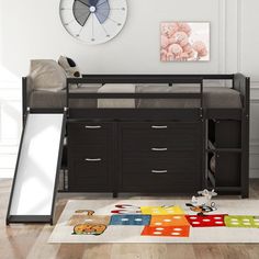 a child's bedroom with a bunk bed and storage space for toys in it