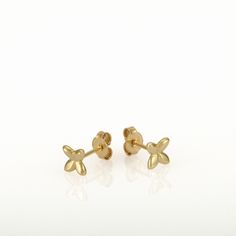 These are small gold earrings, gold flower studs. They are handmade of yellow 14k solid gold and have a shiny finish. Tiny and classy, these earrings are perfect for every day wear and will always be in style. A wonderful gift for yourself or for someone you love. 14k solid gold ear backs are included. Size of the earrings is 5.3 x 5.8 mm = approx 0.2 x 0.22 inch * The earrings will be packed in a gift box ready to give as a gift, and shipped via Express mail service which usually takes 5-8 busi Dainty Yellow Gold Flower Earrings, Dainty Yellow Gold Flower Earrings For Gifts, Dainty Yellow Gold Flower Earrings For Anniversary, Dainty 14k Gold Flower Earrings, Dainty 14k Yellow Gold Flower Earrings, Delicate Hypoallergenic Yellow Gold Flower Earrings, Small Gold Earrings, Gold Ear Studs, Tiny Gold Studs