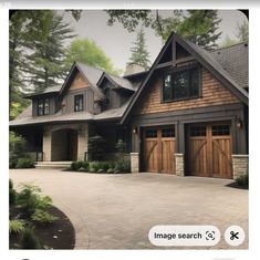 a large house with two garages on the front and one above it's doors