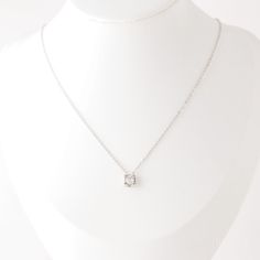 With vintage inspiration, this dainty diamond necklace is minimalistic, yet bold enough to catch the eye. The circular shape and clear cz stone are so versatile they can take you from an important meeting to an exciting night out.• Material: High Quality Stainless Steel• Finish: 18K Rose Gold | 18K Gold | Stainless Steel• Featuring a 6mm Round CZ Diamond Charm with adjustable chain 16 inches to 18 inches.• Waterproof Jewelry• Nickel Free Minimalist Solitaire Necklace In Diamond White For Formal Occasions, Minimalist Diamond White Solitaire Necklace For Formal Events, Formal Minimalist Diamond Necklace With Round Pendant, Minimalist Solitaire Pendant Necklace For Formal Occasions, Minimalist Round Pendant Diamond Necklace For Formal Occasions, Formal Minimalist Solitaire Pendant Necklace, Elegant Square Pendant Diamond Necklace, Elegant Solitaire Necklace With Square Pendant For Formal Occasions, Minimalist Cubic Zirconia Diamond Necklace For Formal Occasions