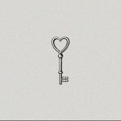 a drawing of a key with a heart on the end is shown in black and white