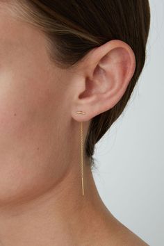 These elegant handmade earrings feature an 18k gold plated sterling silver chain and bar pendant. Pair with delicate gold jewelry to complete the look.
18k gold plated sterling silver, 20 gauge post.
Approx. 2.5" in length
Handmade in USA Yellow Prom, Gold Minimalist Jewelry, Delicate Gold Jewelry, Prom Outfit, Earring Designs, Thread Earrings, Oval Nails, Gold Earrings Designs, Minimal Jewelry