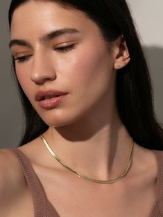 Horizon Herringbone Chain Necklace in Gold | Uncommon James Trendy Herringbone Necklace For Everyday, Trendy Herringbone Necklace With Delicate Chain For Gift, Trendy Gold Snake Chain Necklace With Delicate Chain, Everyday Gold Plated Herringbone Necklace, Everyday Gold Chain Herringbone Necklace, Dainty Snake Chain Necklace For Layering, Delicate Chain Herringbone Necklace As Gift, Dainty Herringbone Necklace With Box Chain, Dainty Everyday Herringbone Necklace With Box Chain