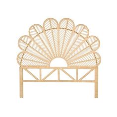 the headboard is made out of bamboo and has a large fan design on it