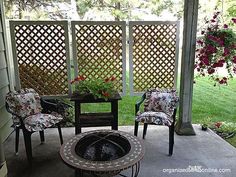 two chairs and a fire pit on a patio with the words summer written over them